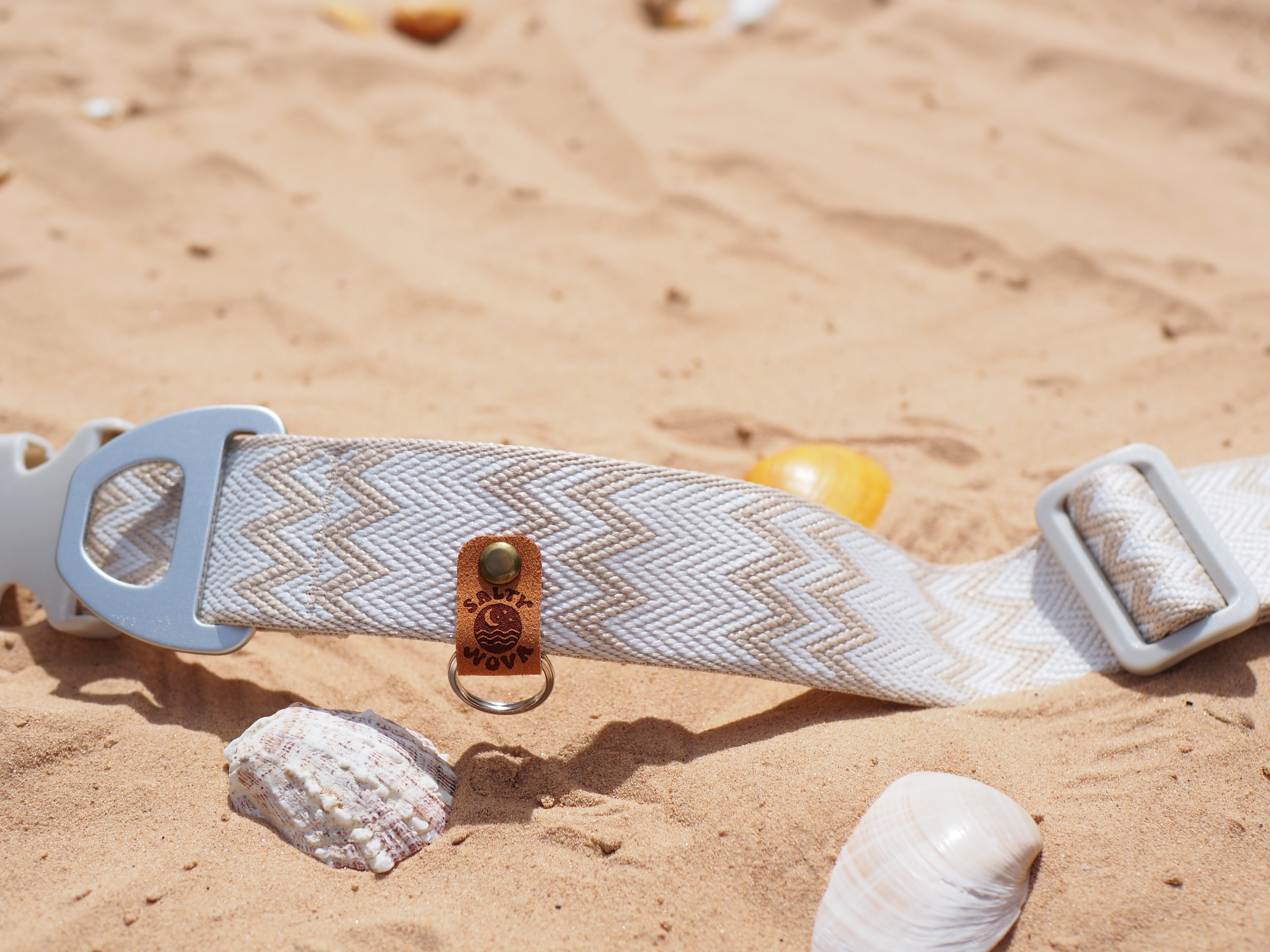 Salty Nova Tides collar in Sea Glass, a handmade 38mm dog collar in soft weathered tones, close-up